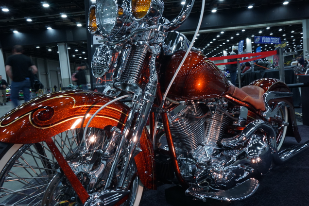 This bike’s a 1999 Harley Softail Springer underneath the fantastic paint job and metal mods. Its name? “101 Proof.”